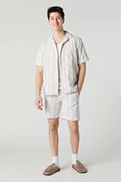 Haut boutonné en tricot rayé