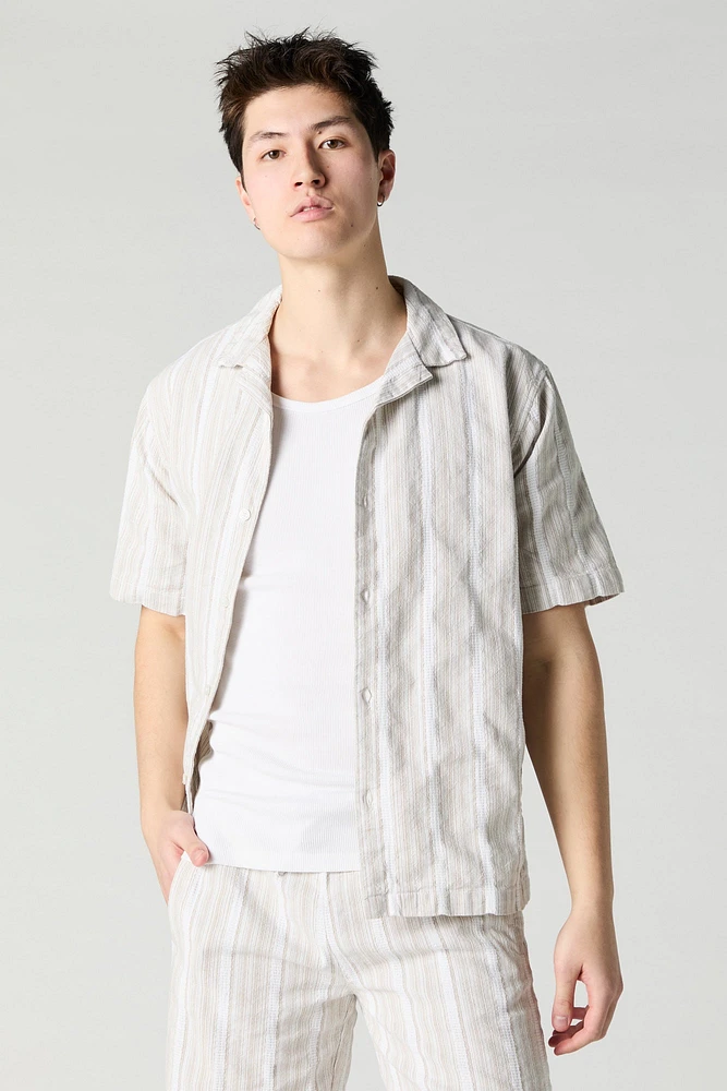 Haut boutonné en tricot rayé
