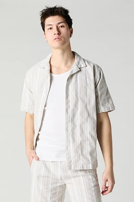 Haut boutonné en tricot rayé