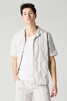 Haut boutonné en tricot rayé