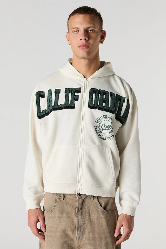Haut à capuchon en molleton avec motif California brodé chenille et fermeture glissière