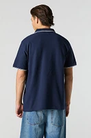 Polo avec motif brodé