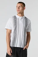 Polo rayé à motif géométrique