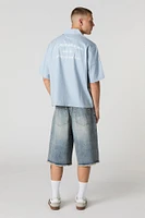 Short de planchiste en denim d'aspect usé délavé noir