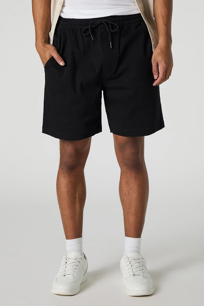 Short mi-long uni à taille coulissante