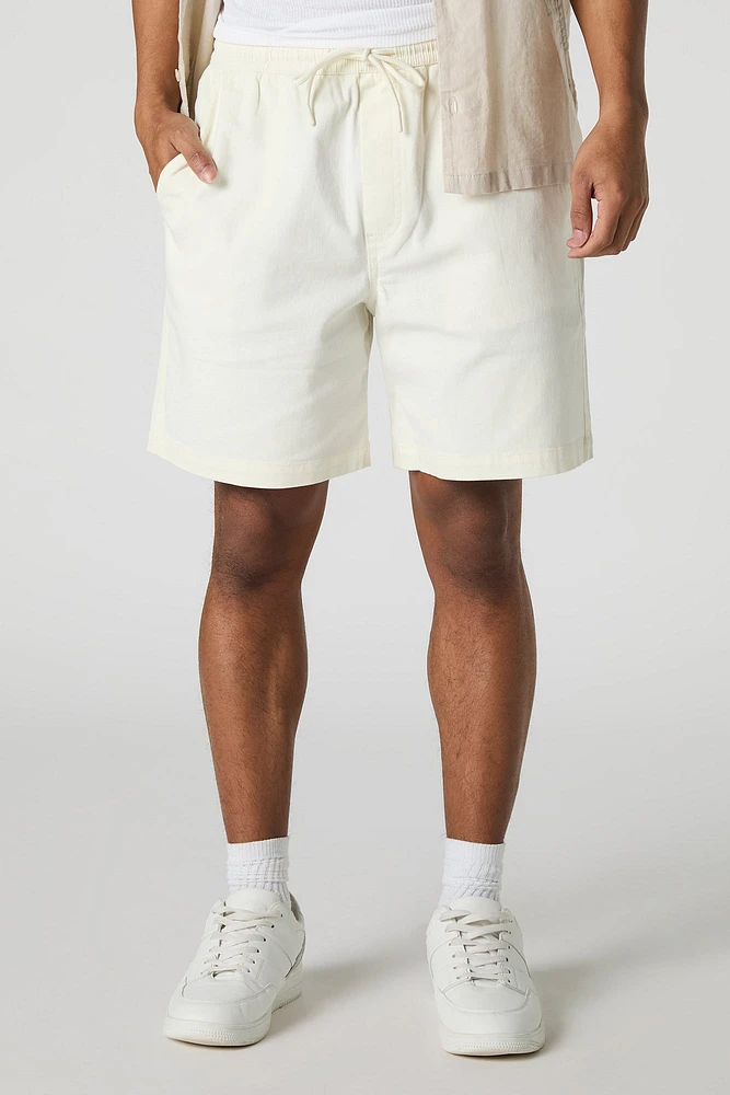 Short mi-long uni à taille coulissante