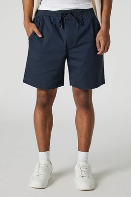 Short mi-long uni à taille coulissante