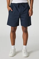 Short mi-long uni à taille coulissante