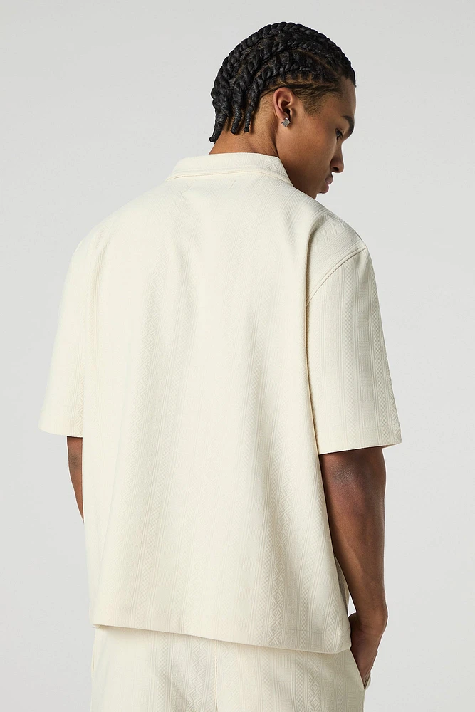 Haut carré boutonné texturé avec motif géométrique
