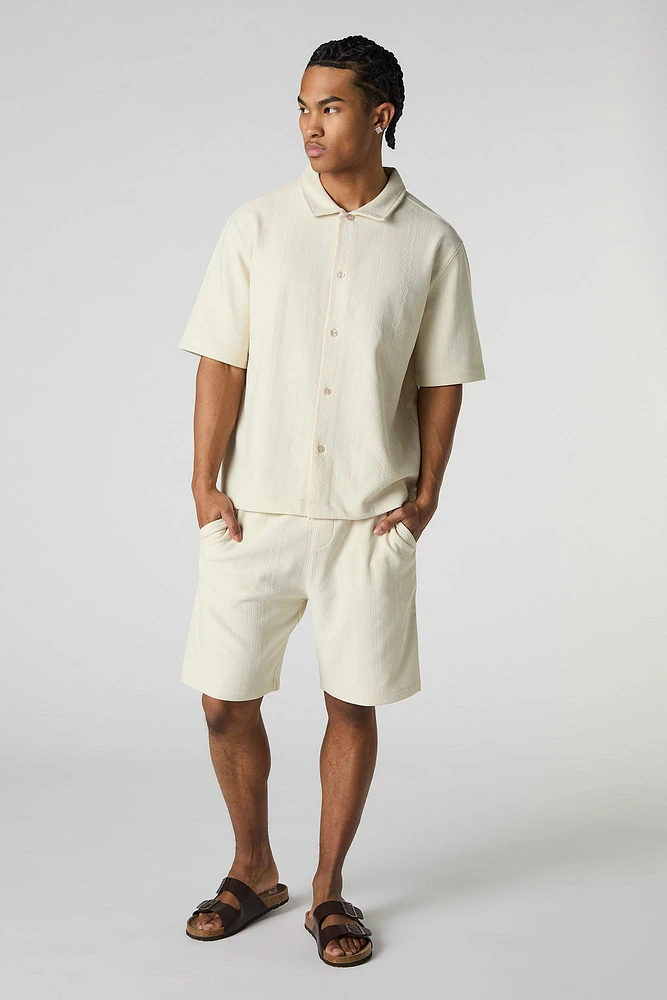 Short texturé à taille coulissante avec motif géométrique