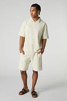 Short texturé à taille coulissante avec motif géométrique