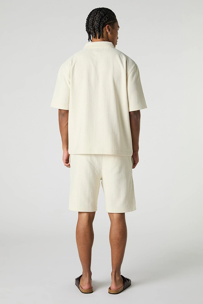 Short texturé à taille coulissante avec motif géométrique
