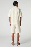 Short texturé à taille coulissante avec motif géométrique