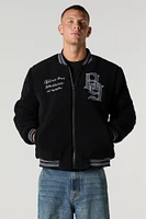 Blouson de style universitaire en Sherpa avec motif brodé