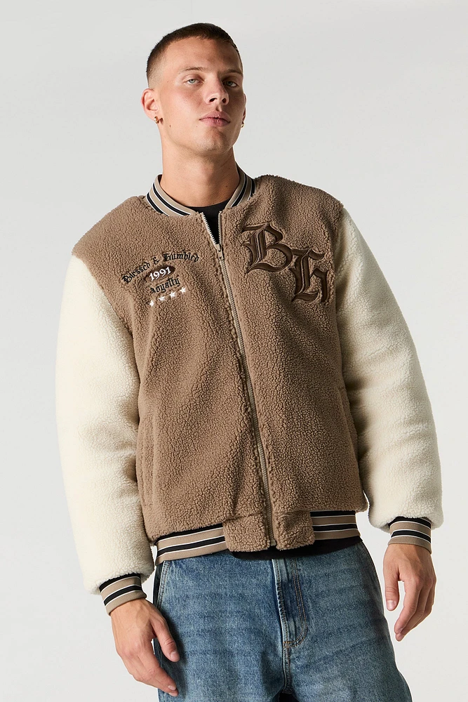 Blouson de style universitaire en Sherpa avec motif brodé