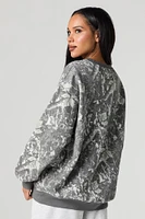 Chandail en molleton avec motif brodé Living The Dream et camouflage