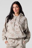 Haut à capuchon en molleton avec motif camouflage