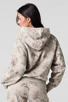 Haut à capuchon en molleton avec motif camouflage