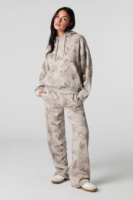 Pantalon d'entraînerment à jambe large en molleton avec motif camouflage