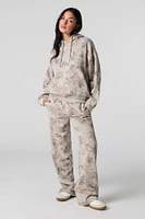 Pantalon d'entraînerment à jambe large en molleton avec motif camouflage