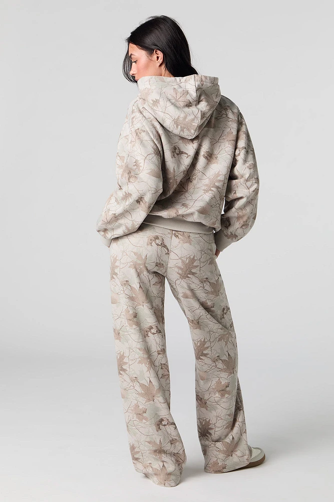 Pantalon d'entraînerment à jambe large en molleton avec motif camouflage