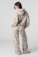 Pantalon d'entraînerment à jambe large en molleton avec motif camouflage