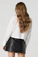 Minijupe-short en similicuir avec ceinture
