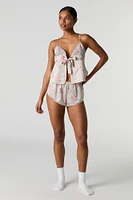 Ensemble pyjama avec débardeur de style nuisette et short en satin