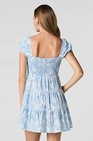 Minirobe volantée smockée fleurie