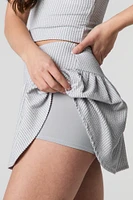 Minijupe-short fluide en tricot côtel