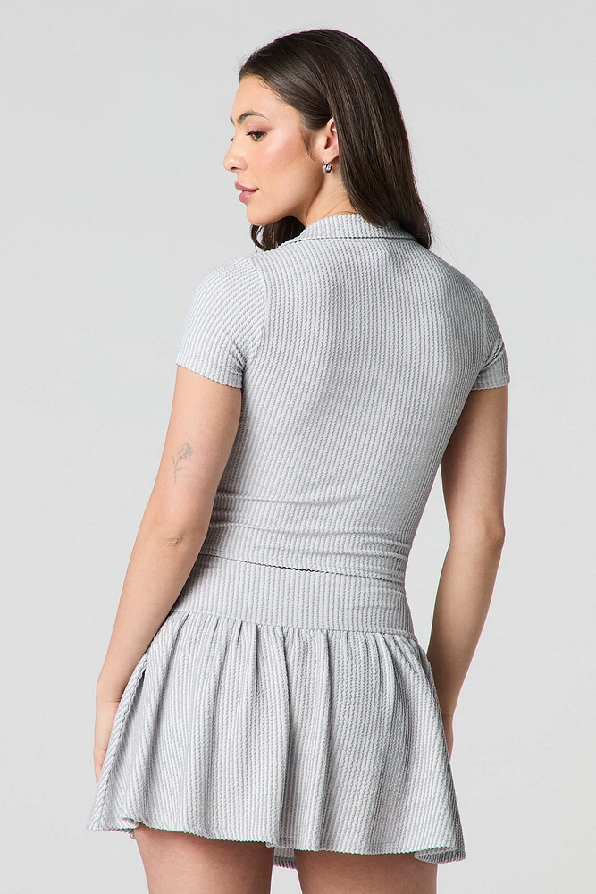 Haut court en tricot côtelé avec col