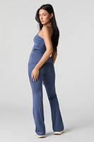 Pantalon profilé à jambe évasée avec taille pliée