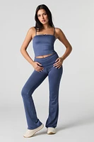 Pantalon profilé à jambe évasée avec taille pliée