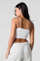 Camisole profilée courte à fines bretelles