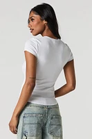 T-shirt côtelé avec ourlet arrondi