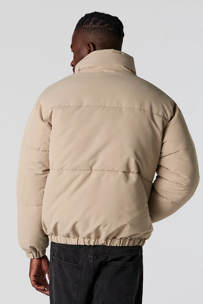 Blouson bouffant à col cheminée