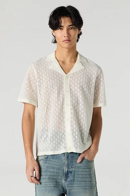 Haut boutonné en tricot de pointelle