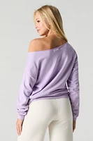 Chandail à épaules dénudées en tissu bouclette