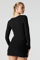 Maillot côtelé à manche longue et découpe