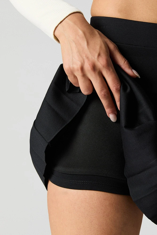 Minijupe-short plissée unie