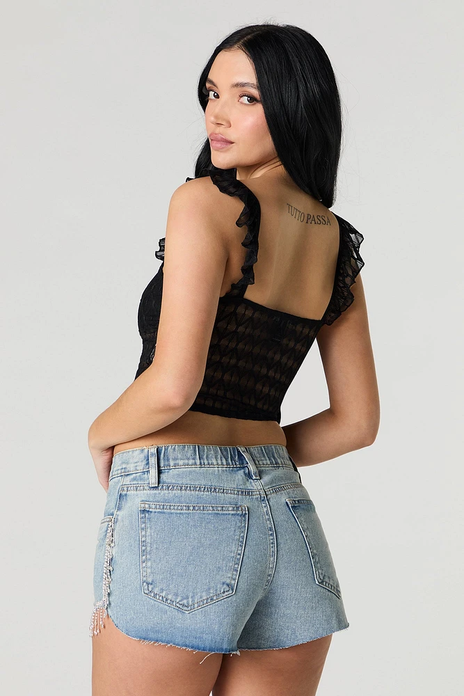 Short en denim avec franges