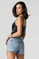 Short en denim avec franges et pierres du Rhin