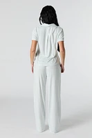 Ensemble-pyjama deux pièces haut boutonné avec col et pantalon