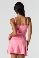 Minirobe-chandail en tricot torsadé avec encolure V