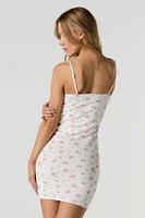 Minirobe moulante avec liséré à boucles