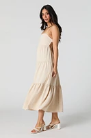 Robe midi étagée à découpe au dos