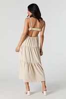 Robe midi étagée à découpe au dos
