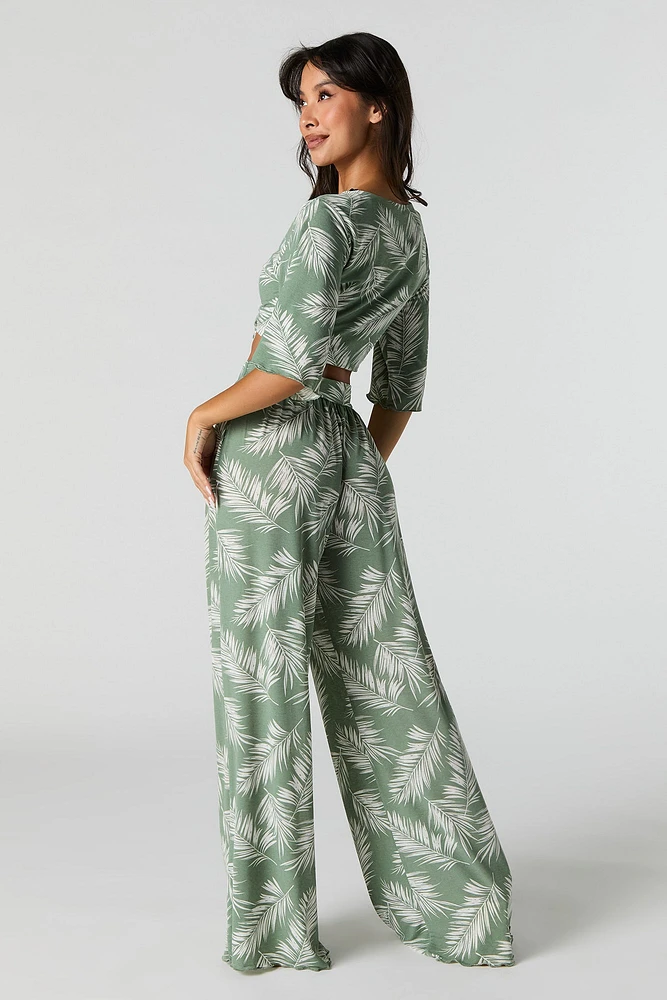 Pantalon à jambe large avec motif de feuilles