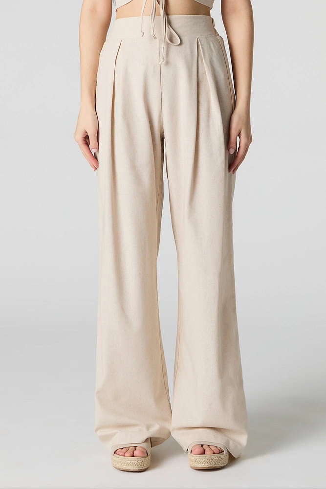 Pantalon à jambe large en mélange de lin plissé