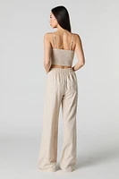 Pantalon à jambe large en mélange de lin plissé